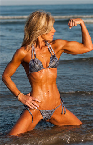 18 year old female Chloe Dash undressing on yoga mat on lawn